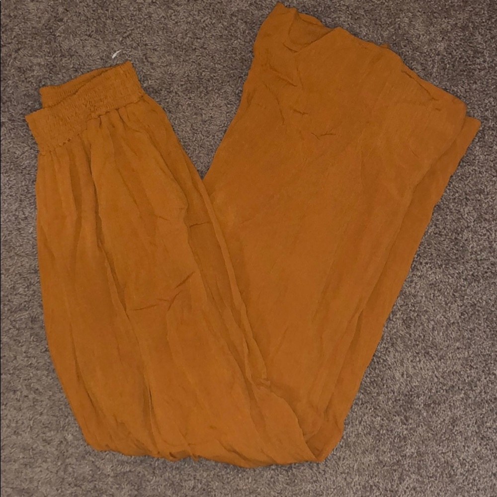 Orange flowy wide leg hippie pants